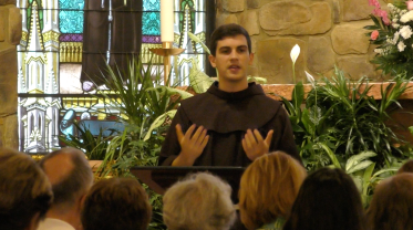 Giving a lecture on Laudato Si in the church to a mixed audience